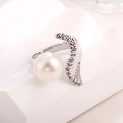 Novelty unique 25 sterling silver pearl ring with small zircon diamond