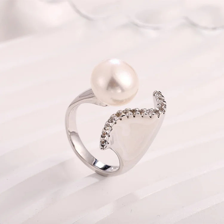 Novelty unique 25 sterling silver pearl ring with small zircon diamond