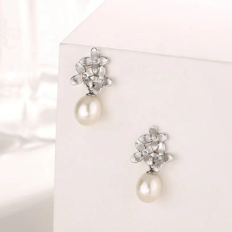 Wholesale bulk trendy luxury irregular shape 925 silver real white pearl studs earrings for women