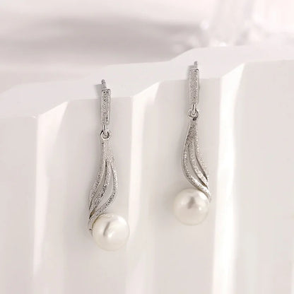 Custom logo earring manufacturer 2024 trend jewelry women zirconia s925 sterling 925 silver simple natural pearl earrings