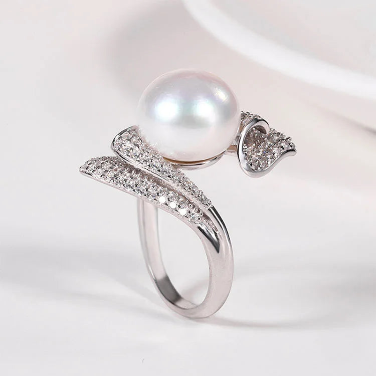 Custom modern one freshwater pearl and cubic zirconia engagement ring with diamonds