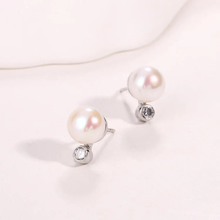 Small round stud 925 sterling silver freshwater cultured pearl earrings with a diamond