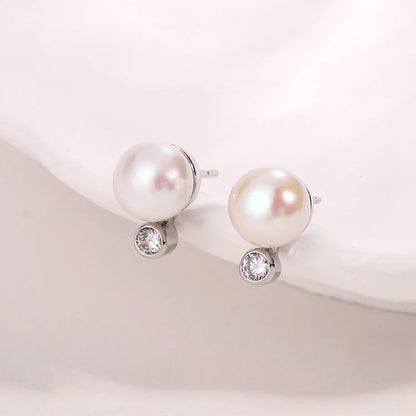 Small round stud 925 sterling silver freshwater cultured pearl earrings with a diamond